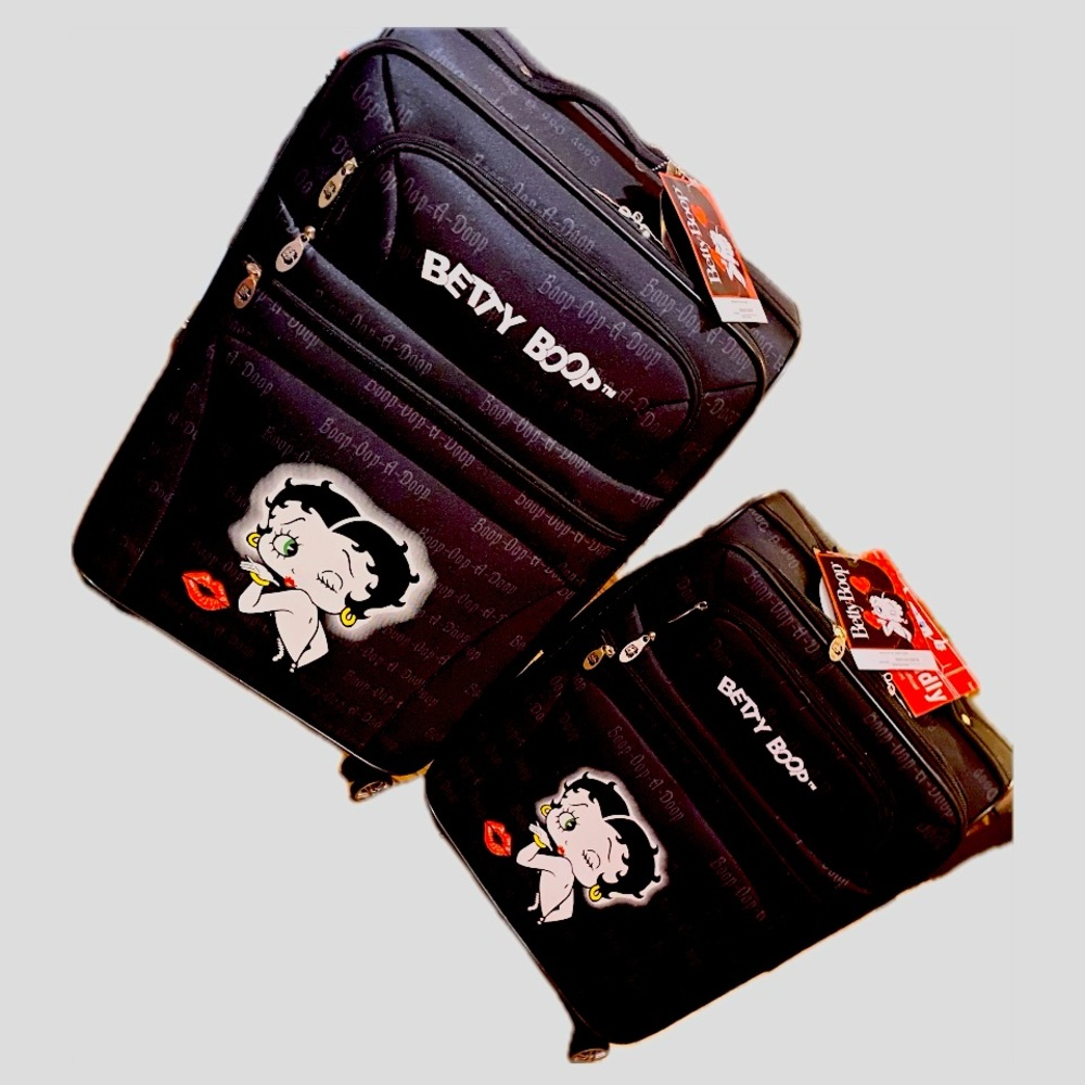 Two Betty Boop Luggage with wheels